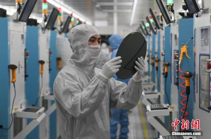 资料图：科技公司工作人员。<a target=<i></i>'_blank<i></i>' href=<i></i>'http://www.chinanews.com/<i></i>'>中新社</a>记者 王刚 摄